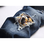 Amiri Jeans Ripped Stretch Jeans